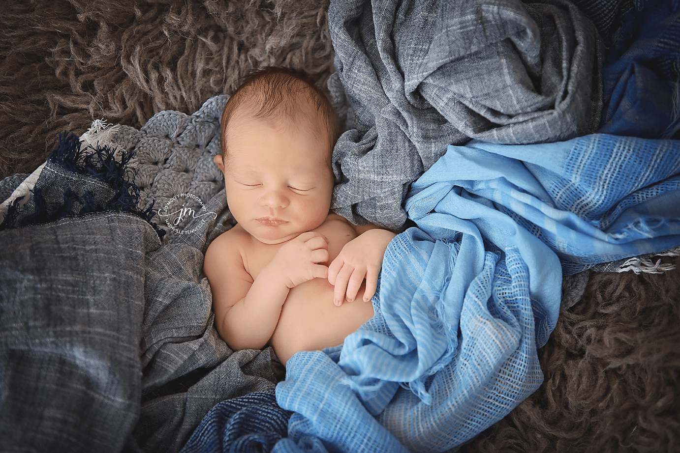 Baby boy sleeping on gray and blue layering blankets - Jo McVey Photography of Nashville, TN