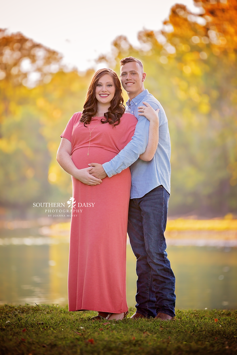 Parents to be standing in front of creek - Nashville pregnancy photos