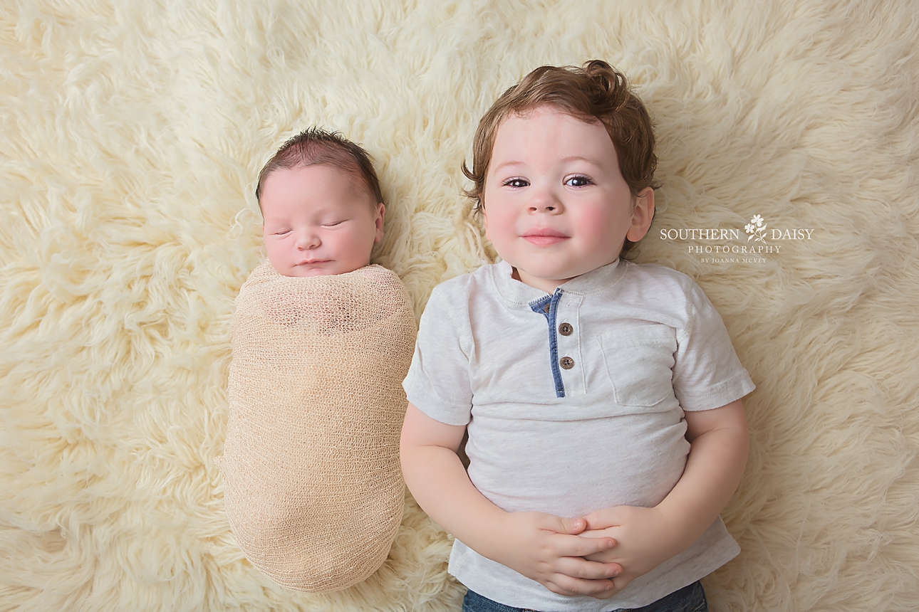 big brother with newborn sibling - Middle Tennessee Baby Photographer