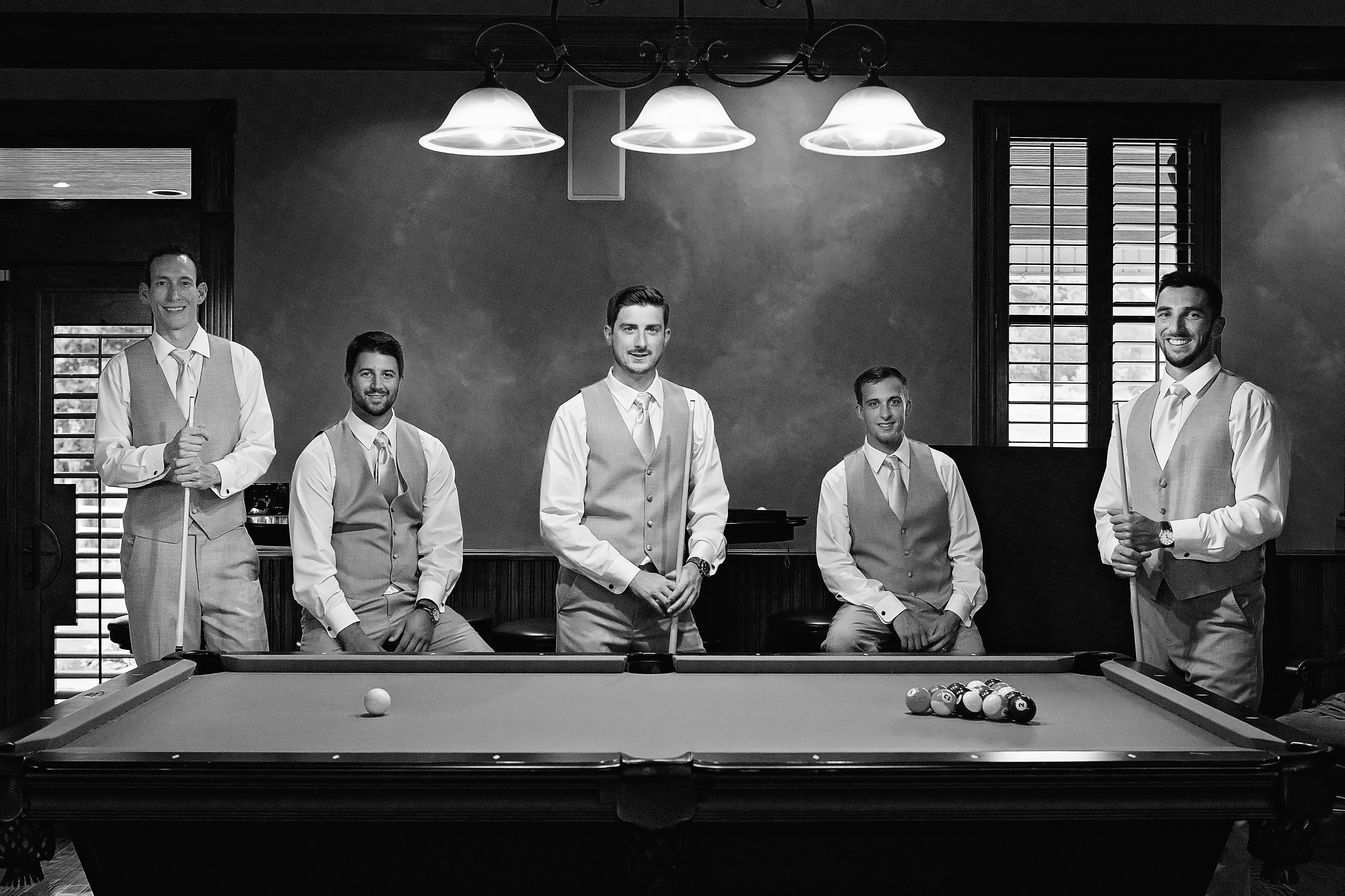 Groomsmen playing pool - Rock Creek Farm - Gallatin Wedding Photographer