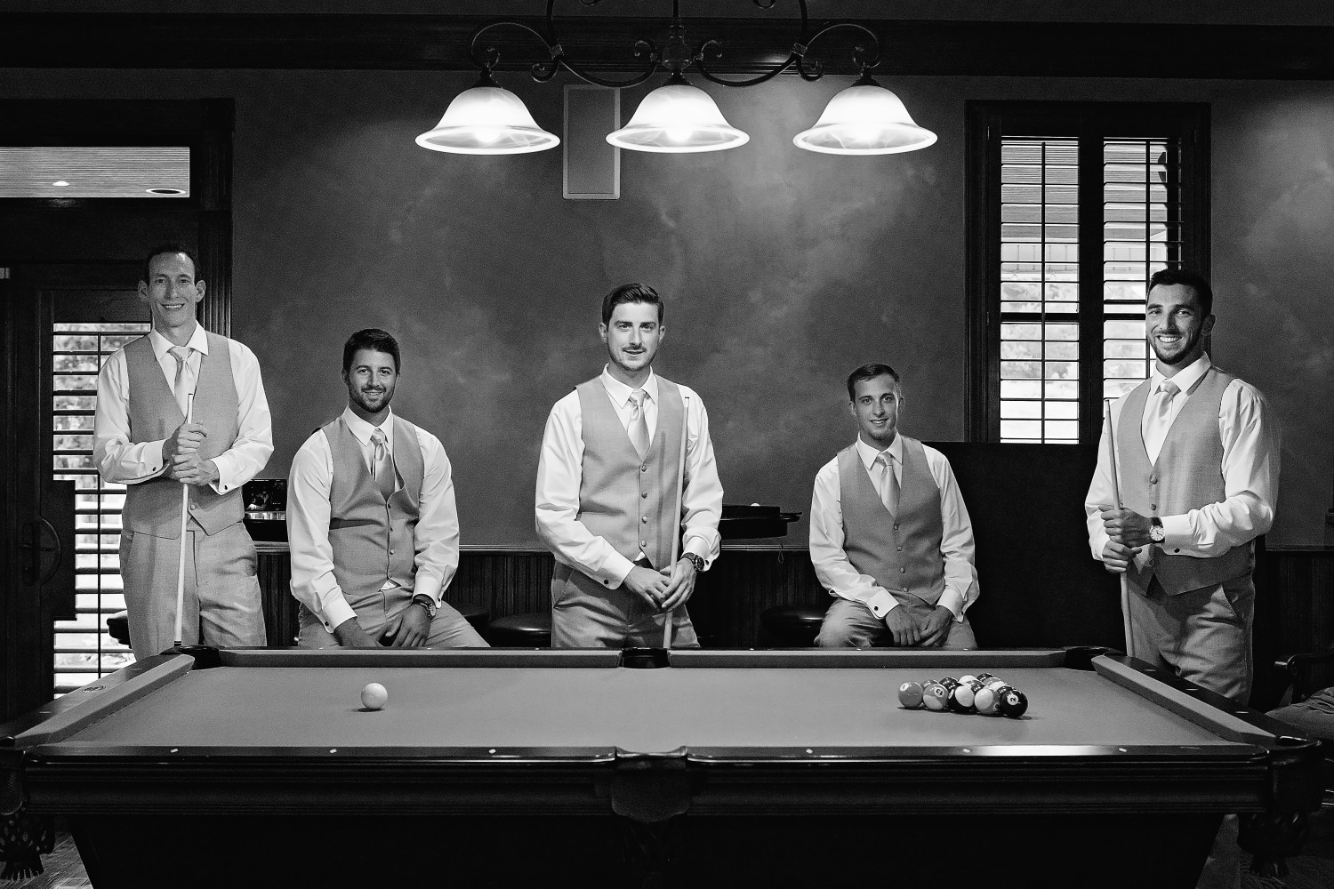 Groomsmen playing pool - Rock Creek Farm - Gallatin Wedding Photographer