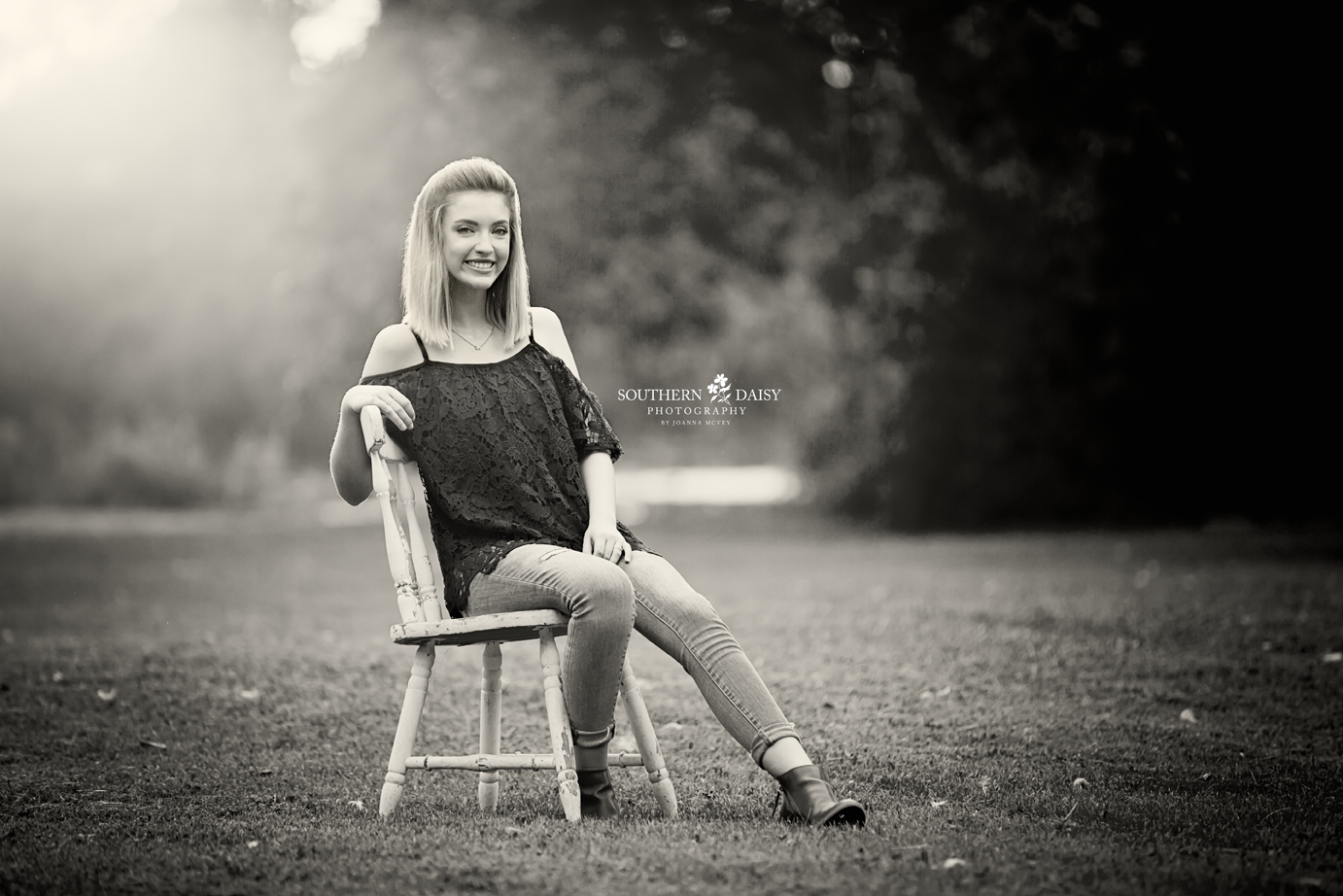 Black and white senior portrait sitting on chair - Nashville Senior Photographer