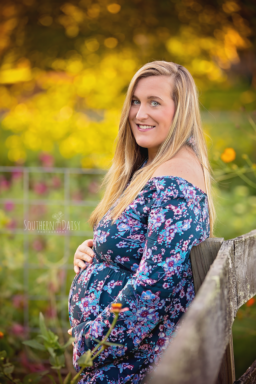 mother-to-be surrounded by flowers at sunset - goodlettsville maternity portraits
